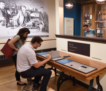 Visitors in a museum gallery about early psychology laboratories